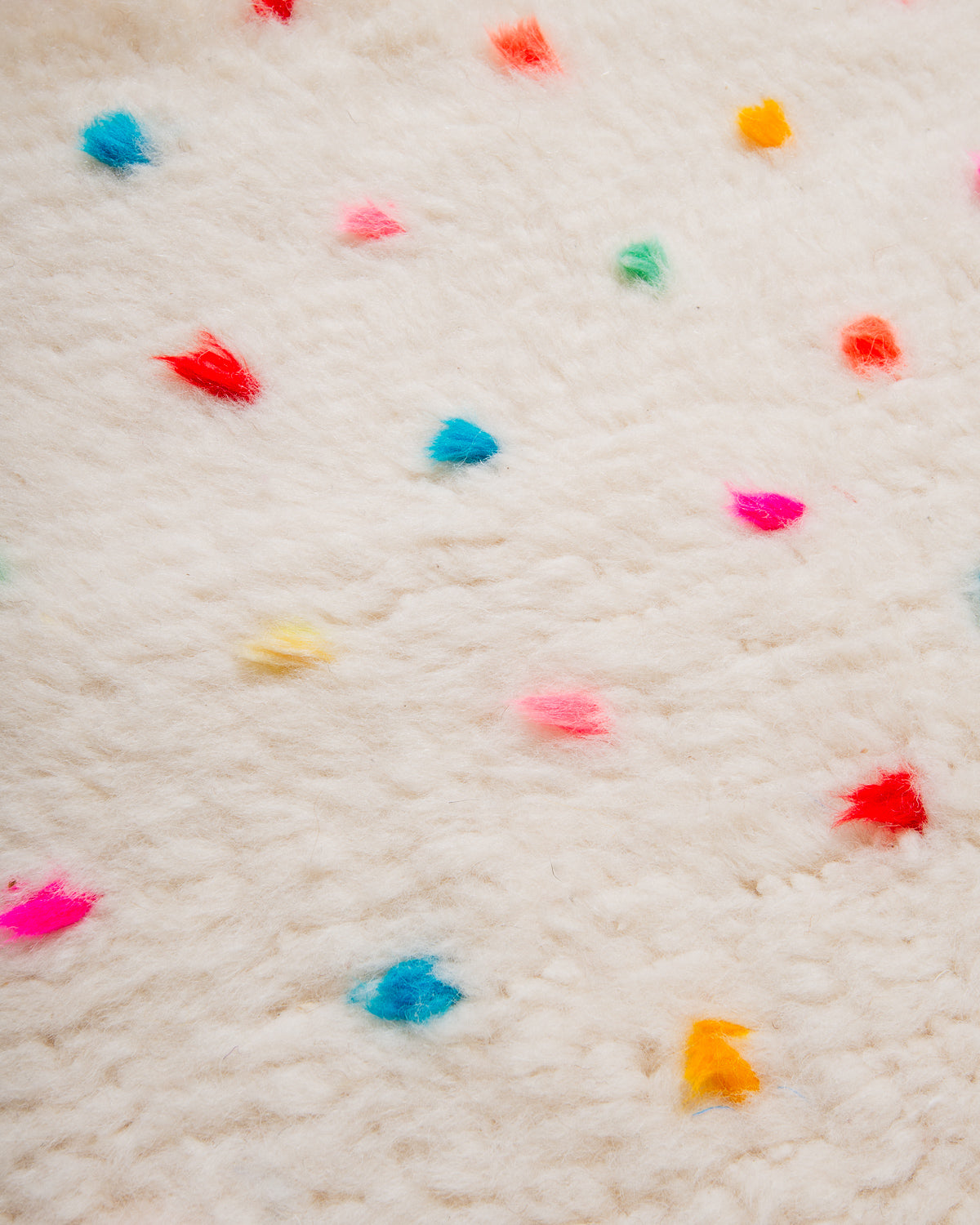 Modern, designer, handcrafted Berber rug from Morocco. Beniourain carpet with beautiful colours and patterns and fluffy wool texture.